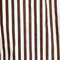 A close-up of a striped fabric pattern featuring alternating vertical stripes of dark brown and white.