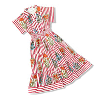 Red and white striped dress with floral patterns on a white background