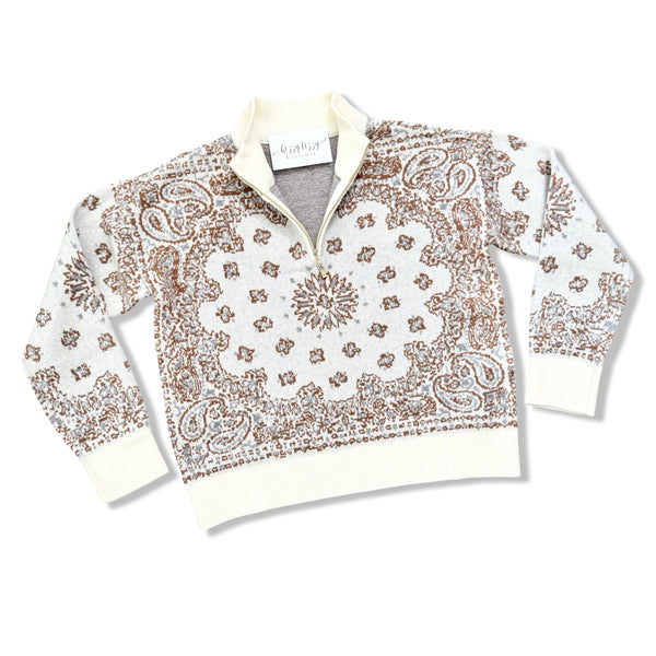A white quarter-zip pullover sweater with a brown paisley and paisley pattern, featuring a ribbed collar, cuffs, and hem, laid flat on a white background.