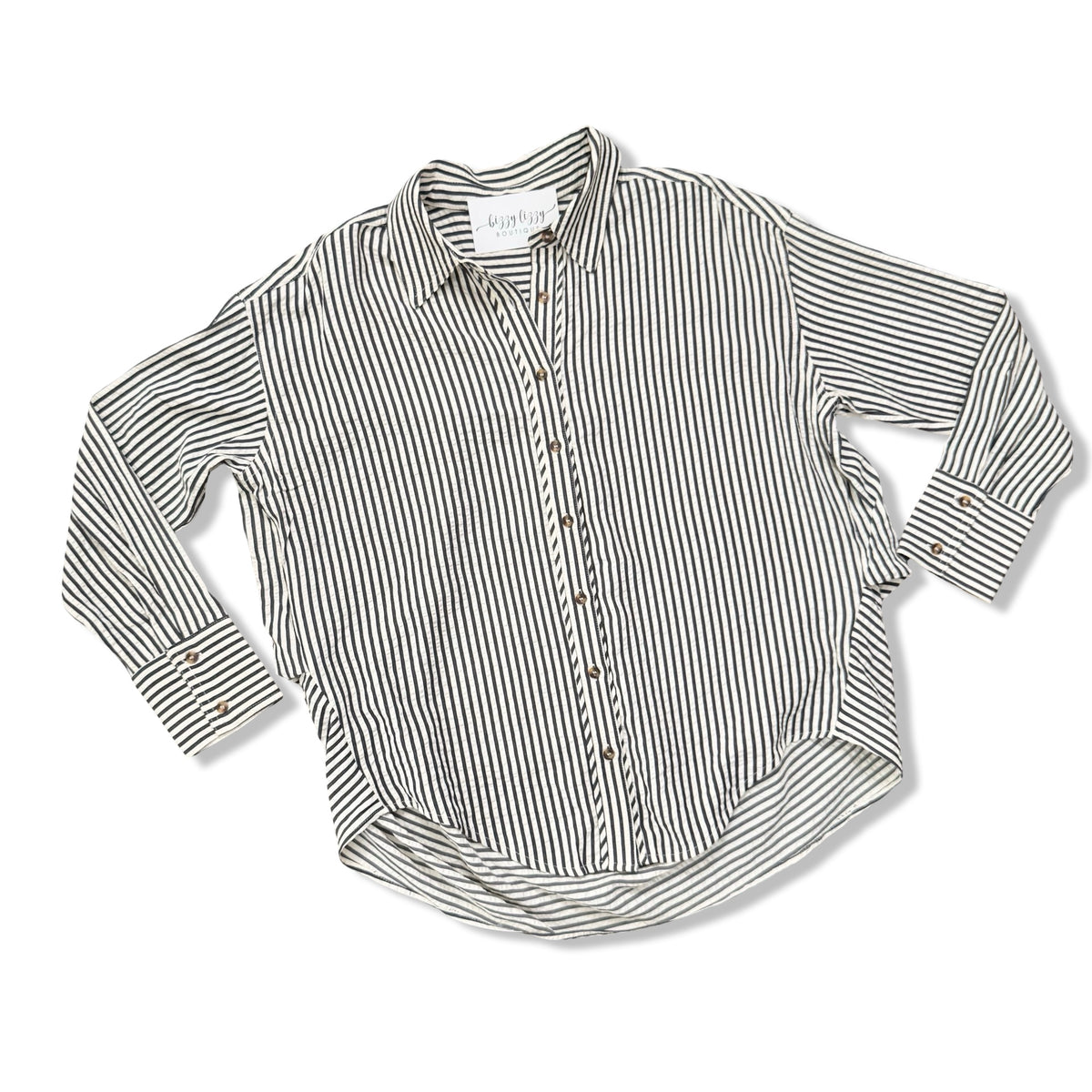 A long-sleeve button-up shirt with vertical dark blue and cream stripes, laid flat on a white background.