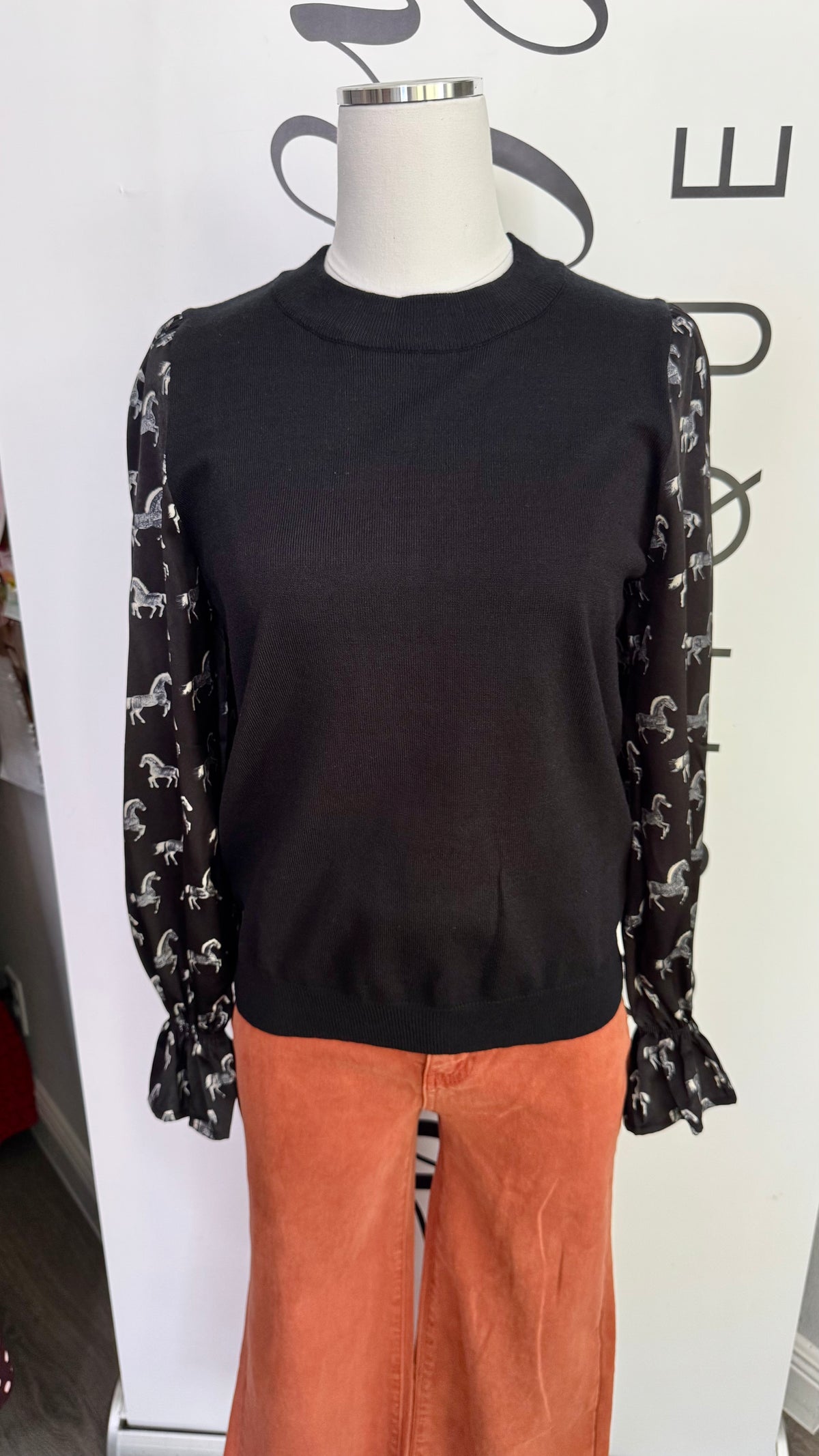 Elliott THML Black Sweater Horse Print Long Sleeve Top Mannequin with Orange Game Day Pants