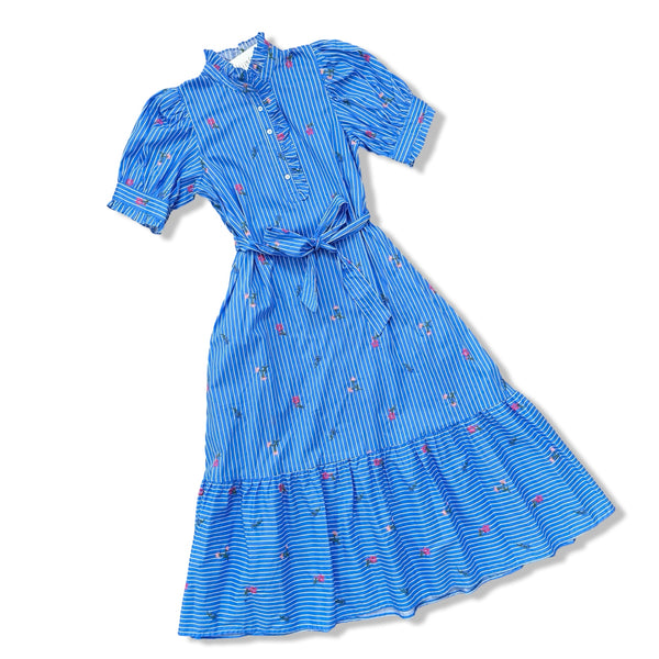 Blue dress with a pattern on a white background