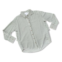 A long-sleeve button-up shirt with thin vertical stripes in olive green and white, laid flat on a white background.