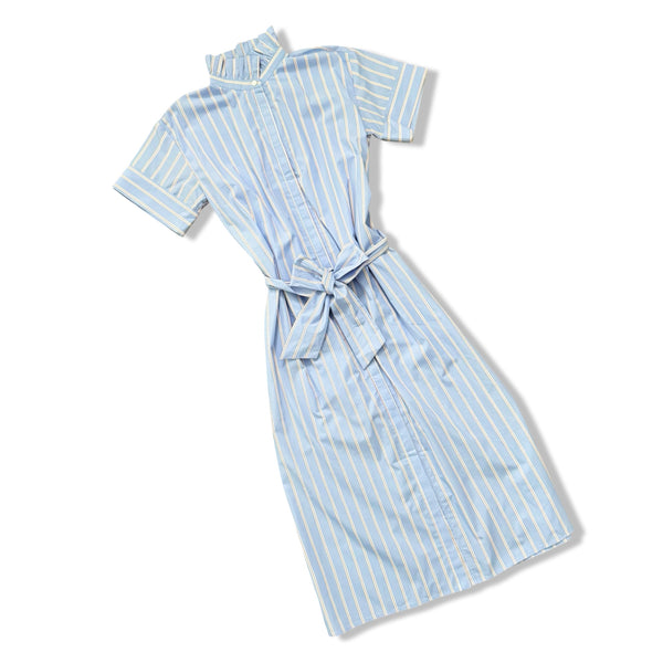 Light blue and white striped dress with a belt on a white background