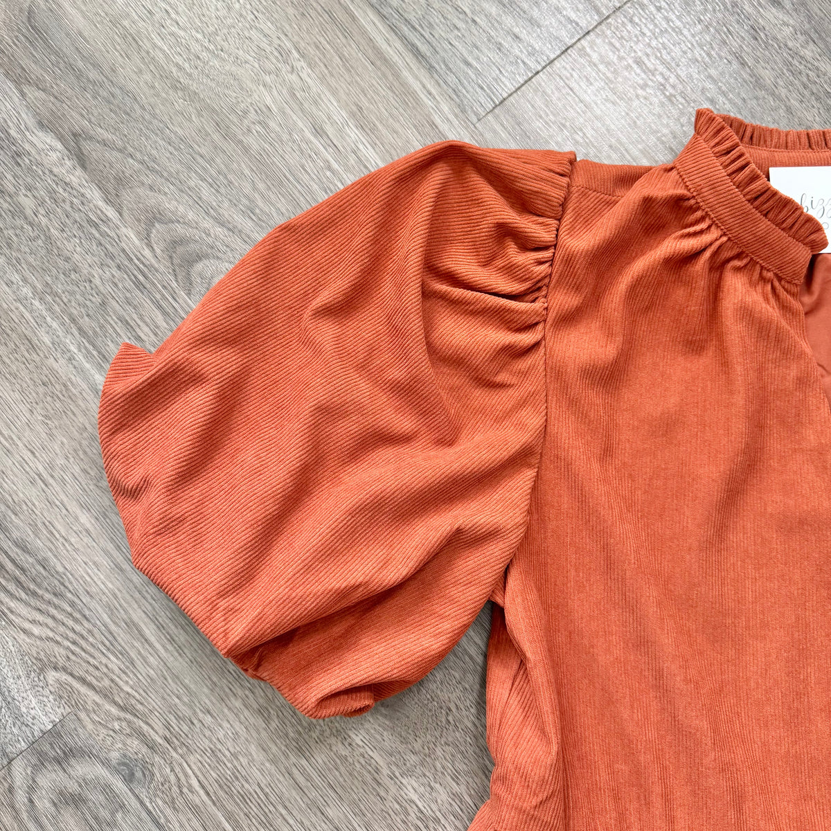 Jacey Burnt Orange Corduroy Babydoll Dress Sleeve Detail