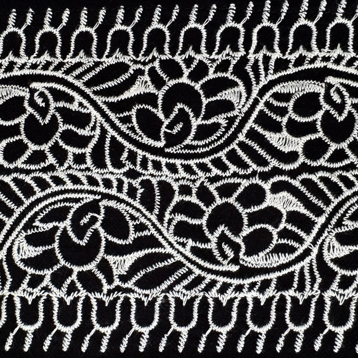 Natalie Entro Embroidered Top Black Embroidery Hem Detail