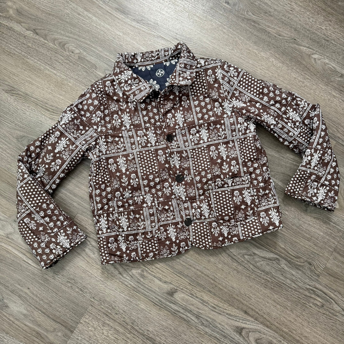 Navy Quilted Reversible Jacket Sugarlips Solara Brown Reverse Side Flat Lay Photo